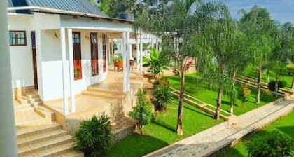 Chill in Style â Your Perfect Stay at Hellens Riverside Villas-KIBO WING Awaits!