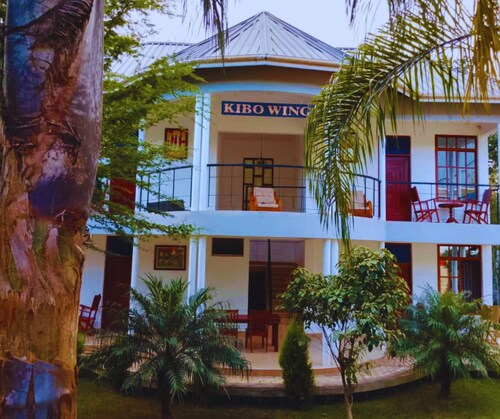 Chill in Style — Your Perfect Stay at Hellens Riverside Villas-KIBO WING Awaits!