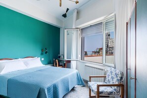 2 dormitorios, tabla de planchar con plancha, wifi gratis y ropa de cama