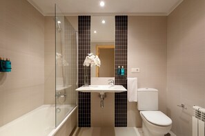 Hair dryer, towels, soap, shampoo