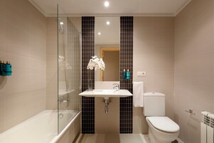 Hair dryer, towels, soap, shampoo