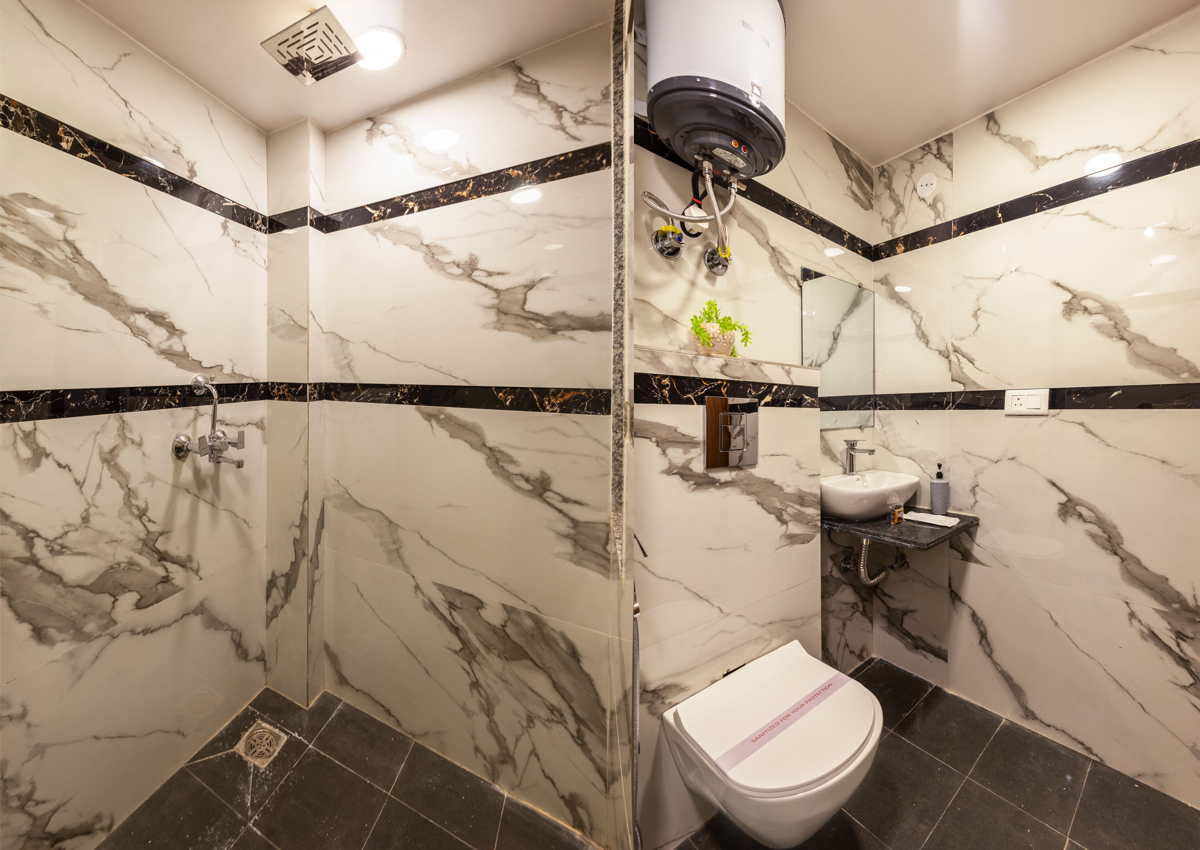 Shower, free toiletries, hair dryer, slippers