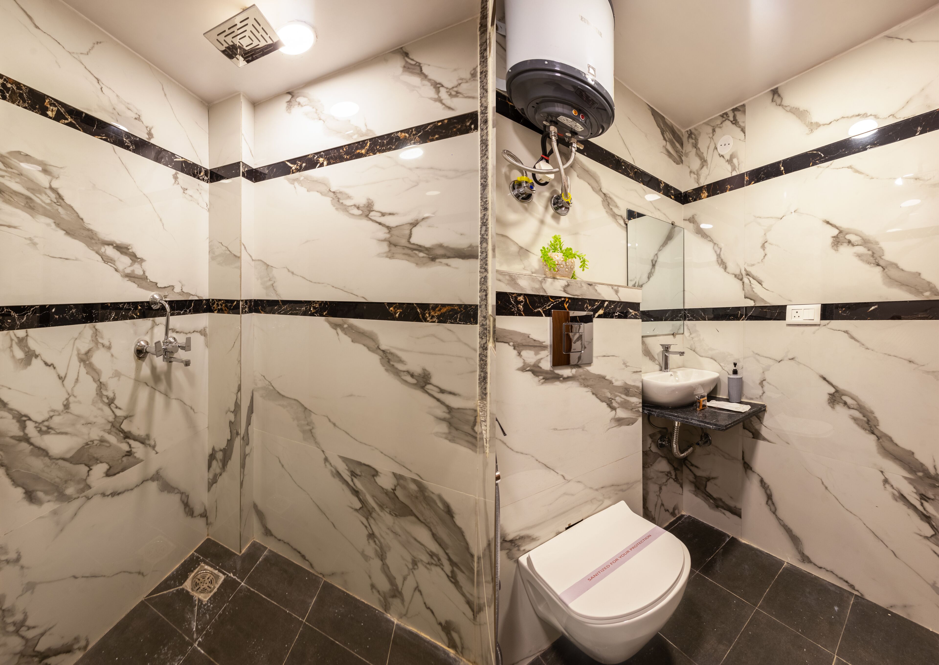 Shower, free toiletries, hair dryer, slippers