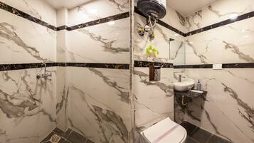 Shower, free toiletries, hair dryer, slippers