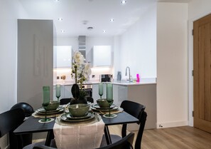 Apartment | Private kitchen | Full-size fridge, microwave, oven, stovetop