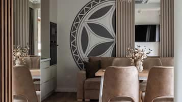 Departamento Deluxe, balcón | Área de sala de estar