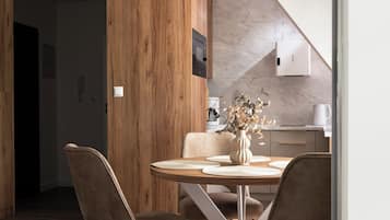 Suite Deluxe, balcon | Coin séjour