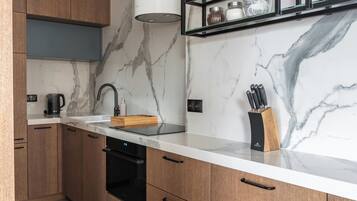 Superior Suite, Balcony | Living area