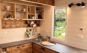 Fridge, stovetop, coffee/tea maker, electric kettle