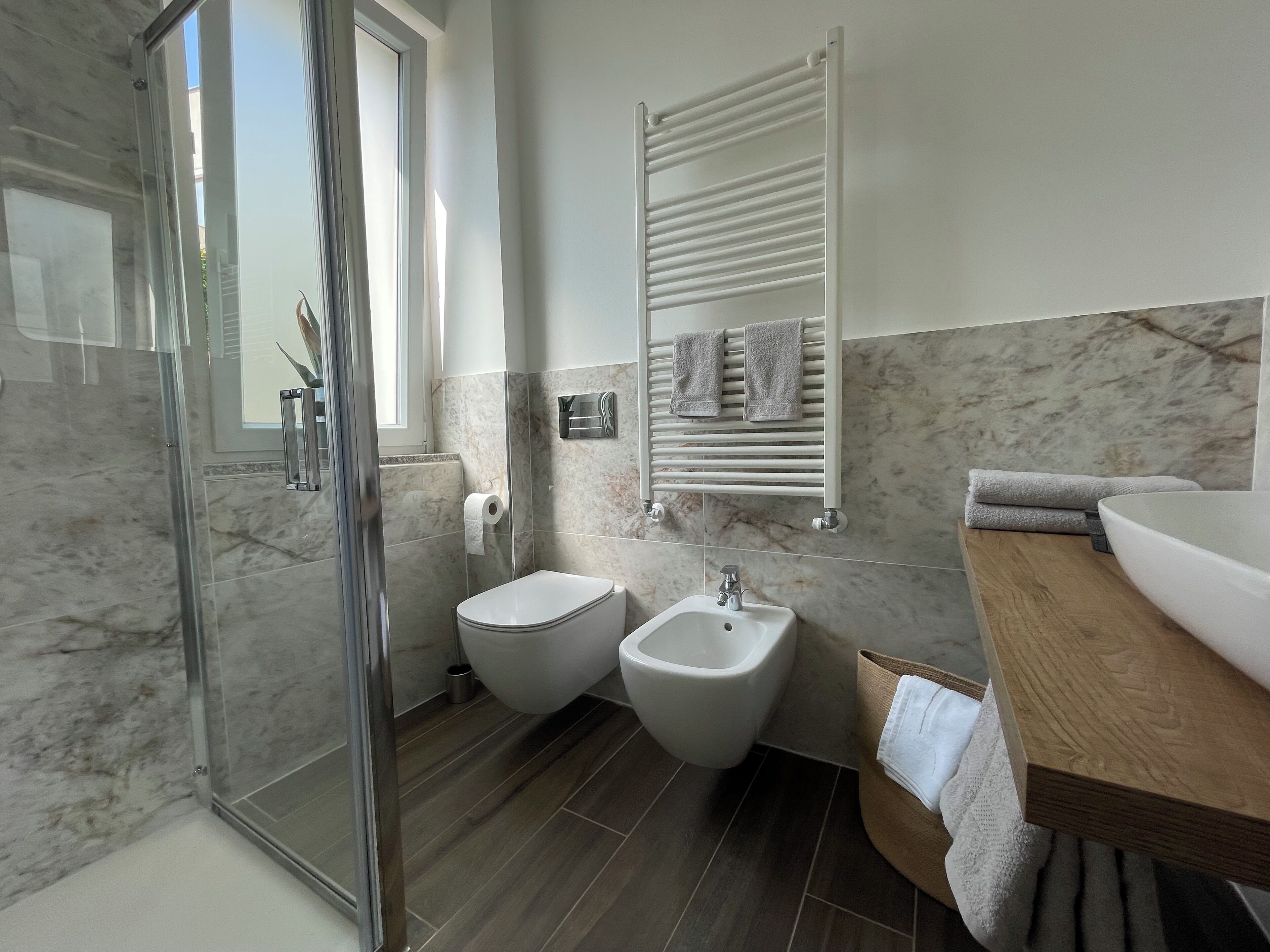 Hair dryer, bidet, towels, soap