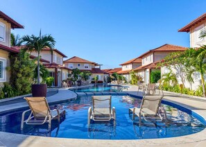 Outdoor pool, open 9:00 AM to 6:00 PM, pool loungers