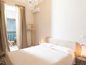 Deluxe Double Room, Balcony, Courtyard View | Frette Italian sheets, premium bedding, down comforters