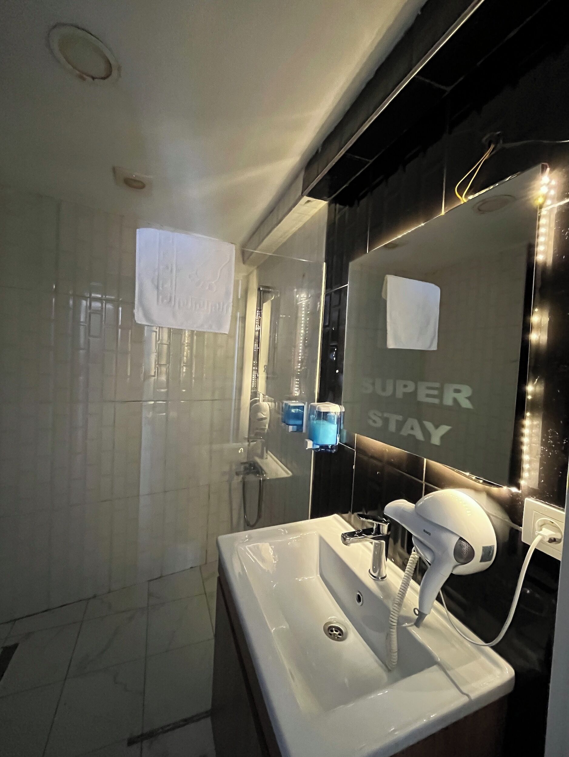Bathroom | Shower, hair dryer, towels, soap