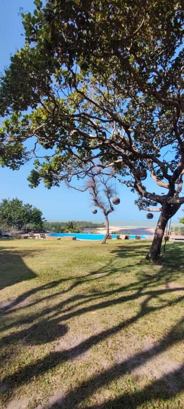 Kamar Double Standar, pemandangan kebun | Seprai premium, bantalan ekstra lembut, minibar, dan Wi-Fi gratis