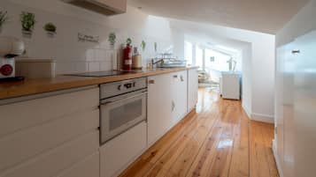 Microwave, coffee/tea maker, cookware/dishes/utensils