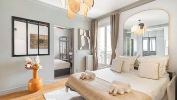 Deluxe Apartment, Courtyard View | Living area | 80-cm Smart TV with digital channels