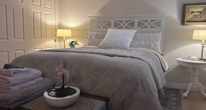Adorable & Whimsical Brand New, 1 Bedroom Garden Bachelor Suite