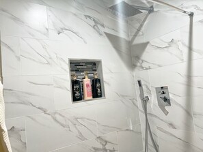 Shower, hair dryer, towels, soap