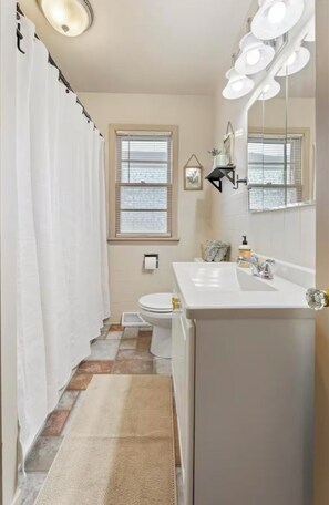 Hair dryer, towels, soap, toilet paper