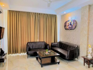 TV, fireplace - Rudra inn 3BHK Villanear All Mandirs Vrindavan (Vrindavan)