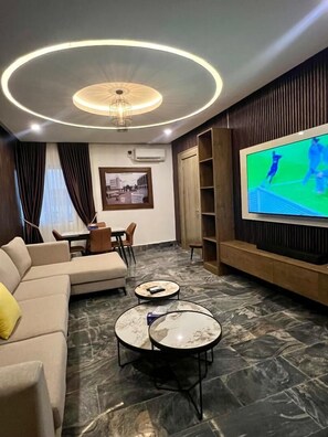 Habitació doble júnior | Zona de menjador de l'habitació