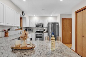 Fridge, microwave, oven, stovetop - Poconos Lake House: Fire Pit, Kayaks, Pool and Lake Access! (Big Bass Lake)