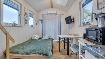 1 slaapkamer, een strijkplank/strijkijzer, wifi, beddengoed