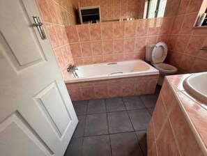 Shower, towels, soap, toilet paper