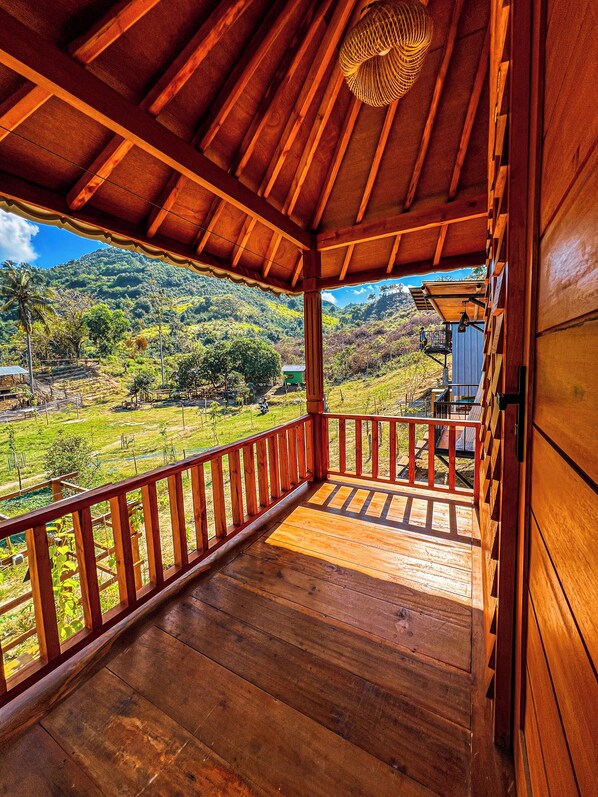 Standard Double Room, Balcony, Garden View | Balcony view