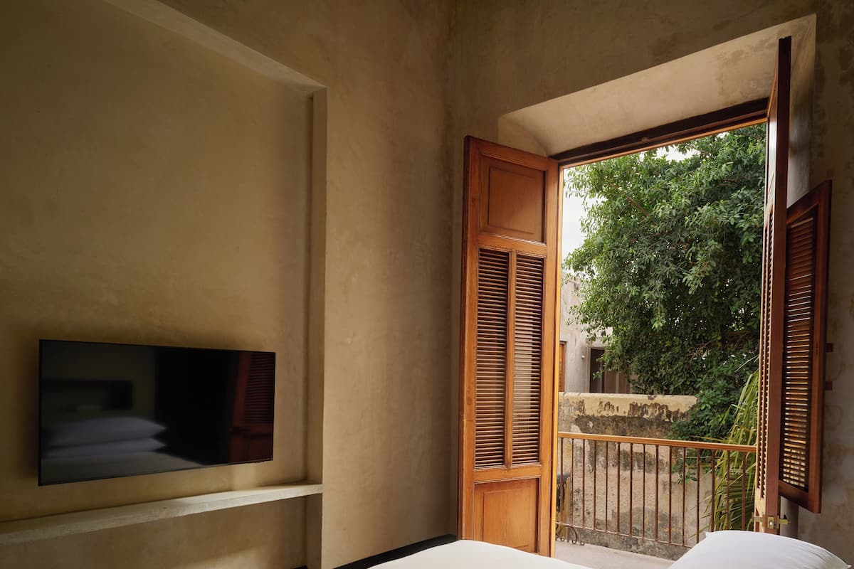Habitación, vista a la alberca | Wifi gratis y ropa de cama 