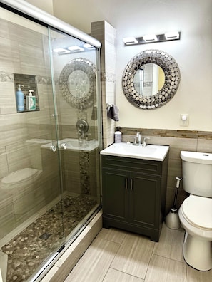 Shower, hair dryer, towels, soap