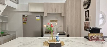 โคซี่ ลอฟต์ คอนโด ในตันซา พร้อมอาร์เคด