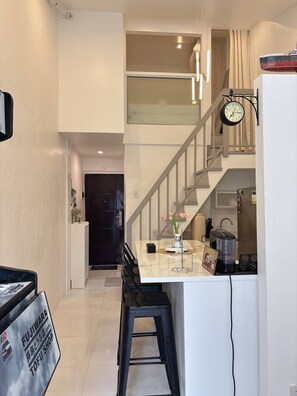 Condo, 1 Bedroom, Smoking, Balcony | Living room - Cozy Loft Condo in Tanza With Arcade (Tanza)