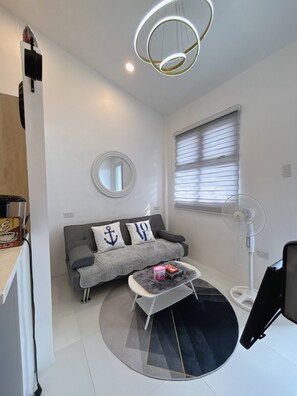 Condo, 1 Bedroom, Smoking, Balcony | Living room - Cozy Loft Condo in Tanza With Arcade (Tanza)