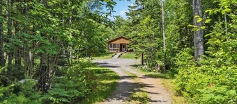 Pinecone Cottage Hot Tub & Projector at Falls Lake