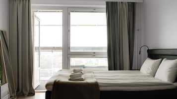 1 bedroom, desk, iron/ironing board, travel crib