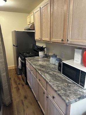 Fridge, microwave, oven, stovetop - Entire Cabin at Woody Falls Trailhead in Cooke City (Cooke City)