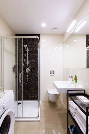 Shower, hair dryer, shampoo