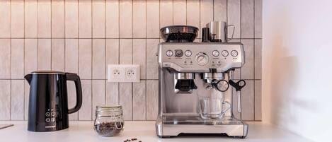 Fridge, stovetop, coffee/tea maker, cookware/dishes/utensils