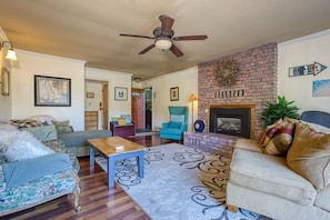 TV, fireplace, books