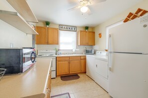 Fridge, microwave, stovetop, coffee/tea maker