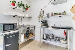 Fridge, microwave, coffee/tea maker, toaster