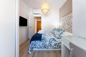 1 habitación, tabla de planchar con plancha, wifi y ropa de cama 