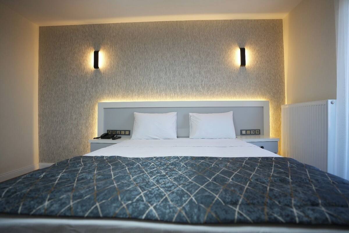 Standard Double Room, Balcony, City View | Iron/ironing board, free WiFi