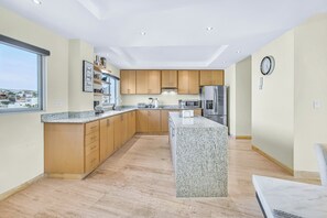 Microwave, stovetop, coffee/tea maker, toaster