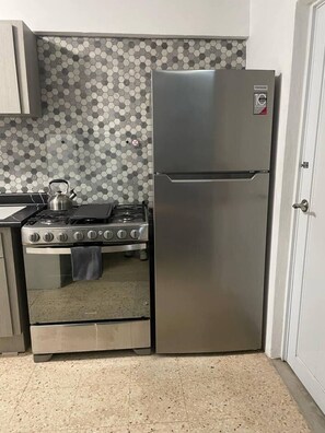 Fridge, microwave, oven, stovetop