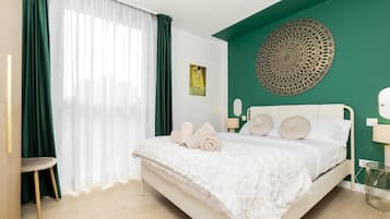 1 dormitorio, tabla de planchar con plancha, Internet y ropa de cama