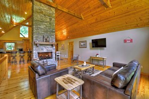 Télévision, cheminée, baby-foot