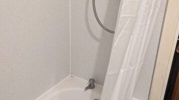 Shower, towels, toilet paper