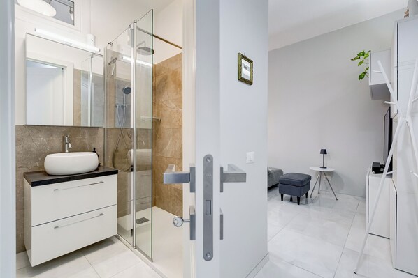 Hair dryer, towels, soap, toilet paper